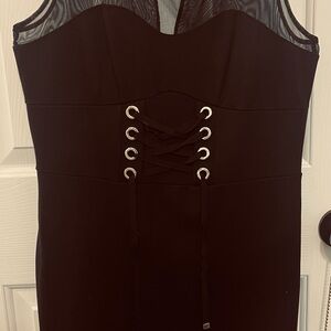 Beautiful  never used black dress. Size 8 runs slightly small.